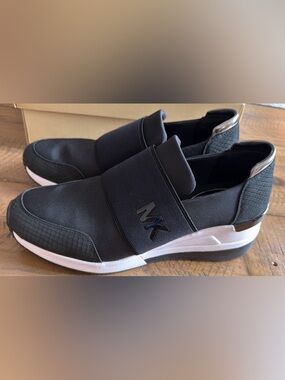 Michael Kors Black Slip-On Loafers with White Sole